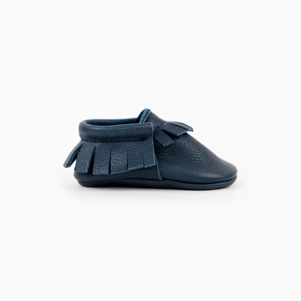 Navy blue leather baby moccasins from Amy and Ivor
